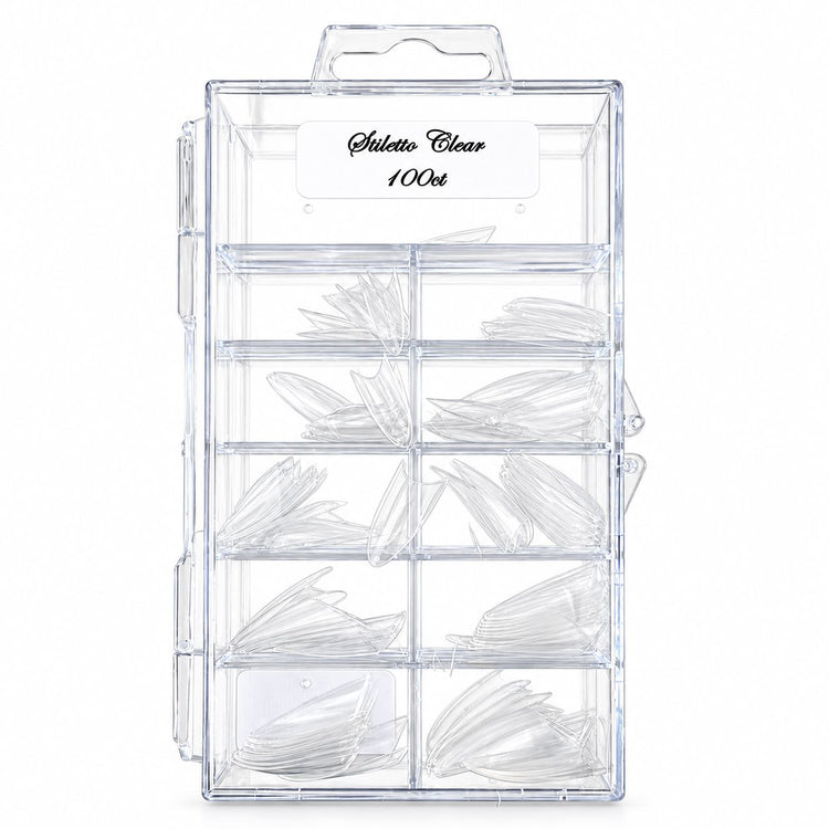 Tray of 100 clear stiletto nail extension tips in assorted sizes, organised into compartments in a transparent storage box.
