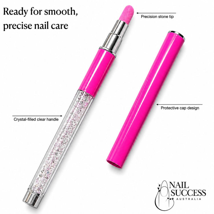 Infographic of a pink stone cuticle file pen highlighting the precision stone tip, crystal-filled clear handle, and protective cap design for smooth, precise nail care