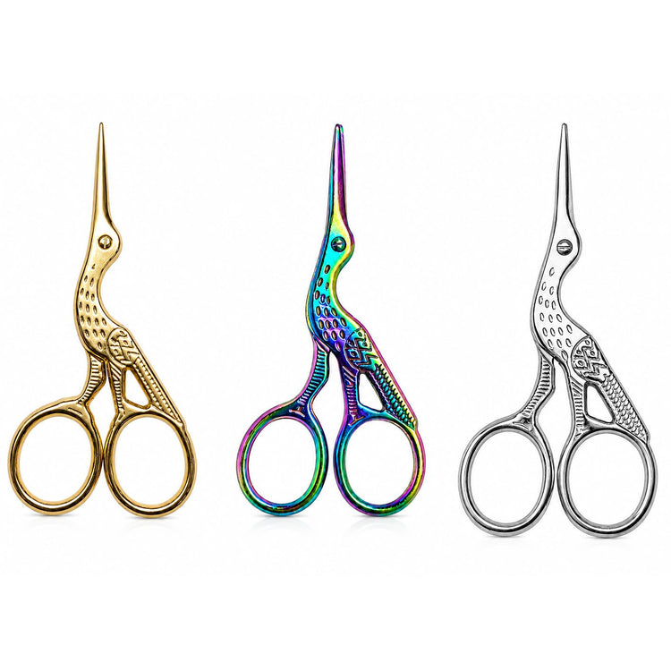 Gold, rainbow and silver stork nail scissors displayed together on white background, NSI Australia