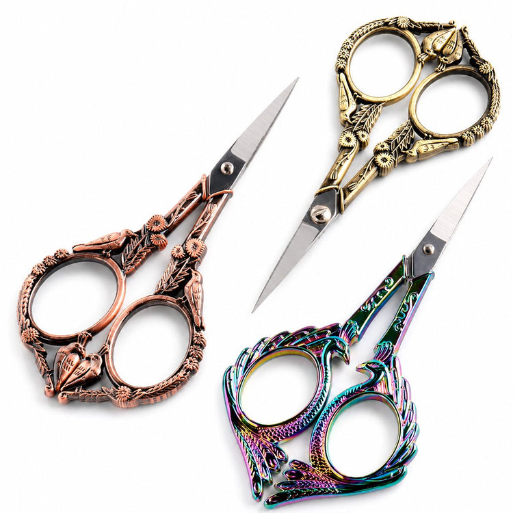 Copper, gold and rainbow stylish bird nail scissors with ornate decorative handles, NSI Australia