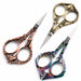 Copper, gold and rainbow stylish bird nail scissors with ornate decorative handles, NSI Australia