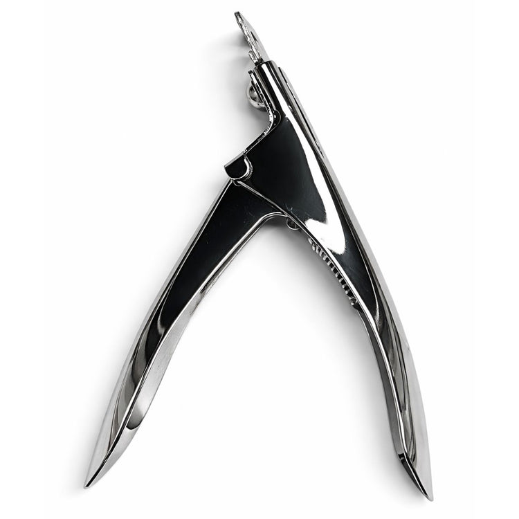 Back side view of stainless steel nail tip cutter with spring-loaded handle for artificial nail tip trimming