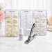 Classic square nail tips tipping pack with natural, clear and white half well ABS tips, Polybond nail glue and tip cutter on salon marble background