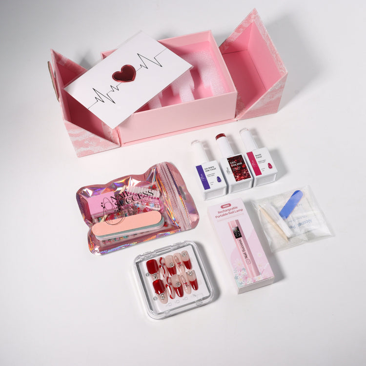Nail Success Australia Valentine’s nail gift box with HEMA-free gel polish trio (base coat + colour + no-wipe top coat), mini rechargeable nail lamp, press-on nails and manicure tools