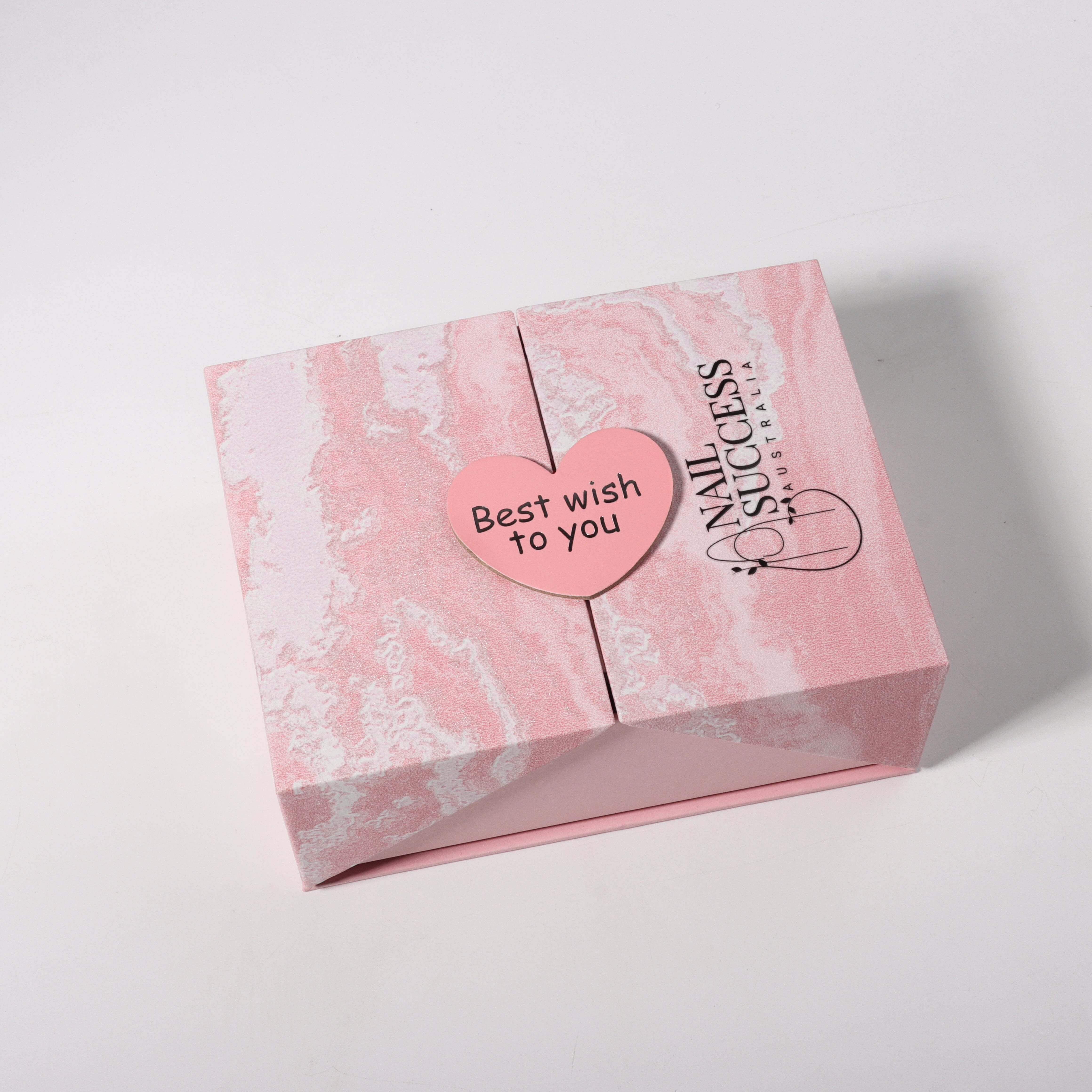 Nail Success Australia Valentine’s nail gift box closed in pink marble packaging with “Best wish to you” heart tag