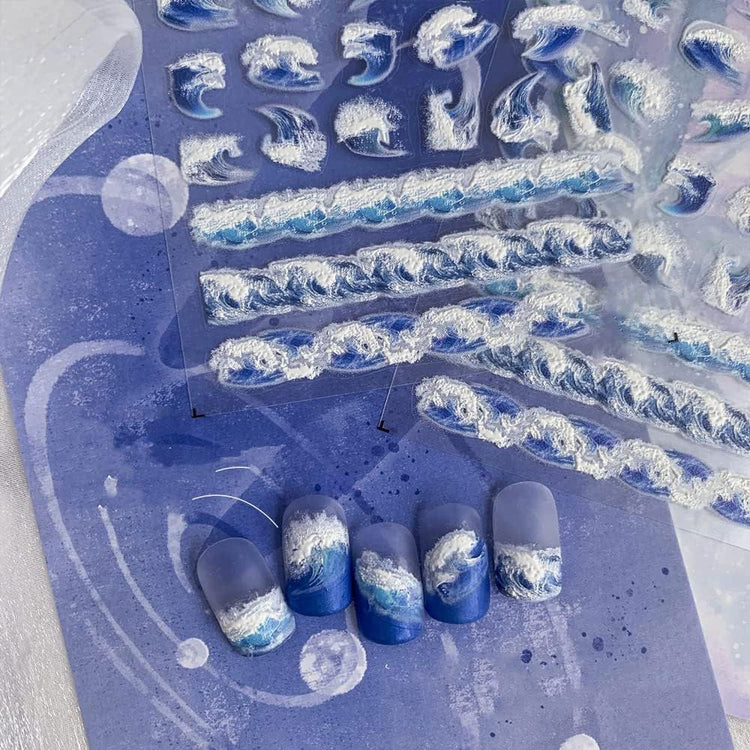 3D ocean wave nail art sticker sheet with foamy surf decals and blue ombré sample nails