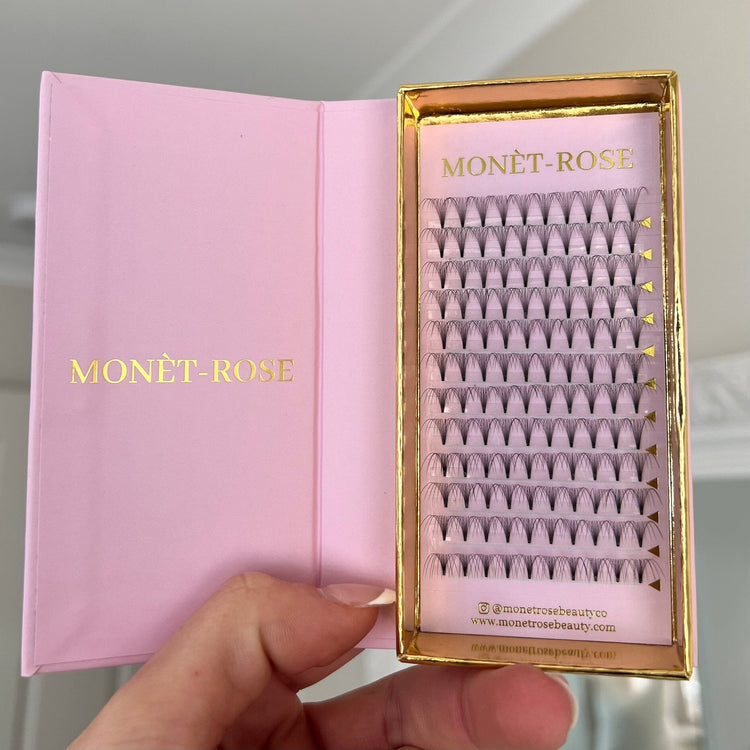 Monèt-Rose 10D short-stem D-curl 0.05 lash fans — pink tray in open gold-edged box